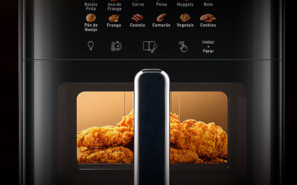 Visor transparente com luz interna. Acompanhe sua receita sem abrir a gaveta, mantendo o calor e garantindo cozimento eficiente. O painel intuitivo facilita a escolha dos programas automáticos, trazendo mais precisão para cada tipo de alimento.