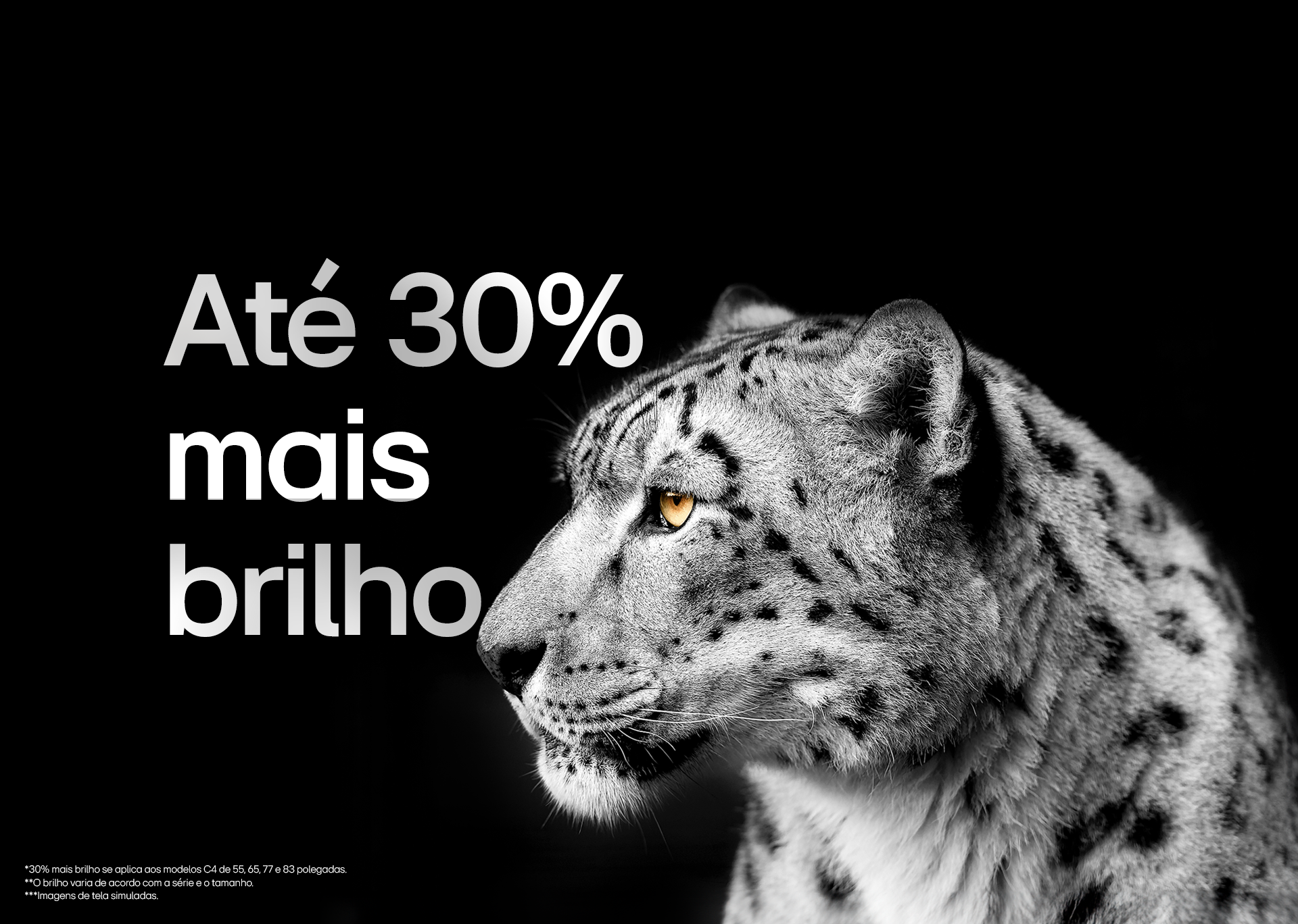 Leopardo branco mostrando a lateral da sua face no lado esquerdo da imagem. A frase `Até 30% mais brilho` aparece à esquerda.